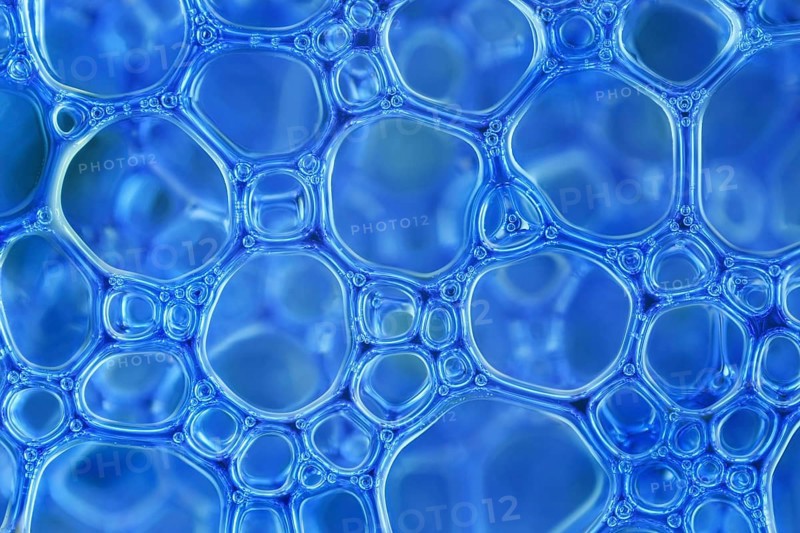 Blue foam bubbles in close-up