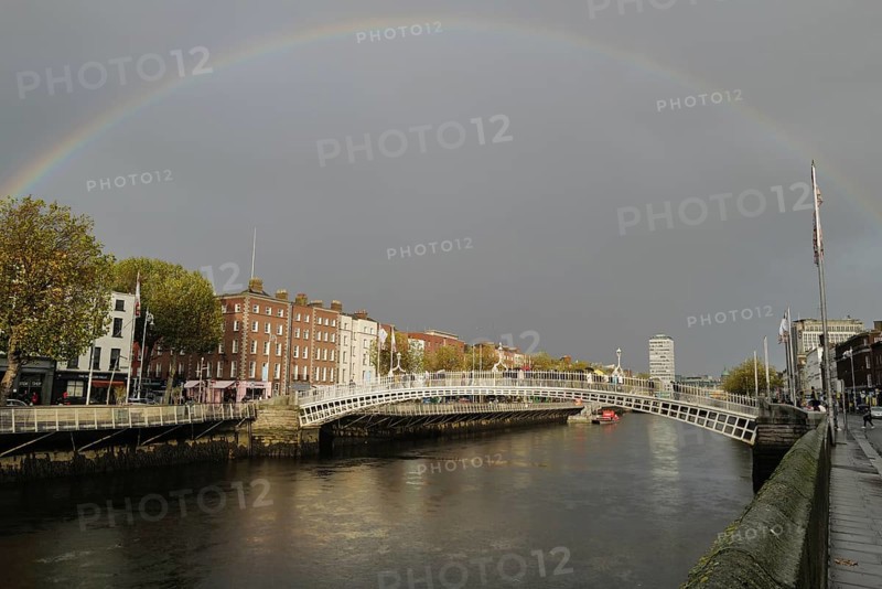 A rainbow over the River Liffey at the Hapenny Bridge
