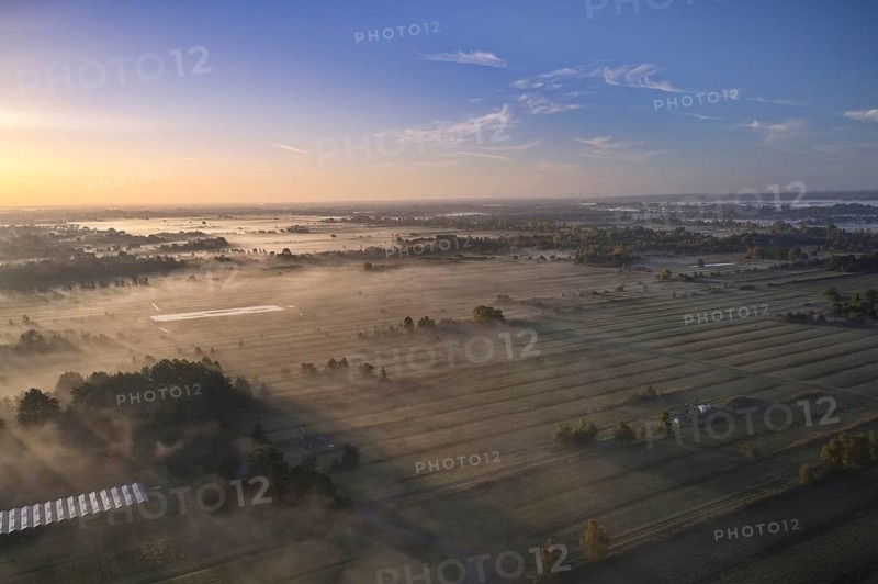 Aerial view of the Kirchwerder Wiesen nature reserve in Hamburg's Vier- und Marschlanden in the morning mist