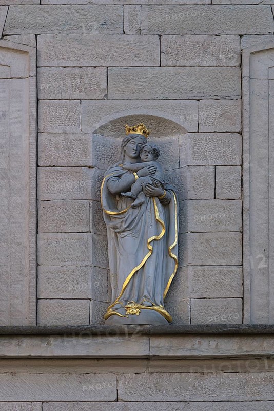 Sculpture of Maria Immaculata on a house facade around 1850