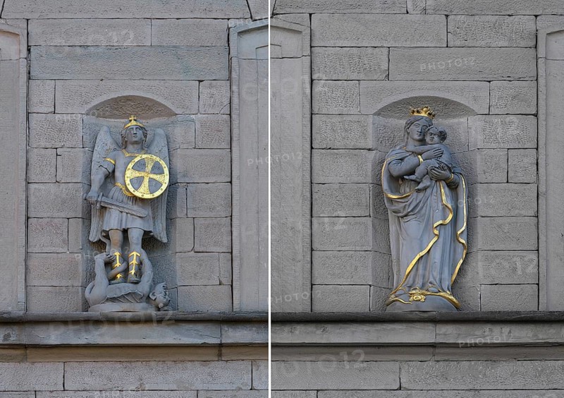 Sculpture of St. George with the dragon and Maria immaculata on a house facade c. 1850