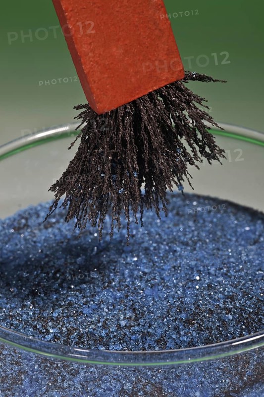 Bar Magnet Separating Iron Filings from a Mixture with Copper Sulphate