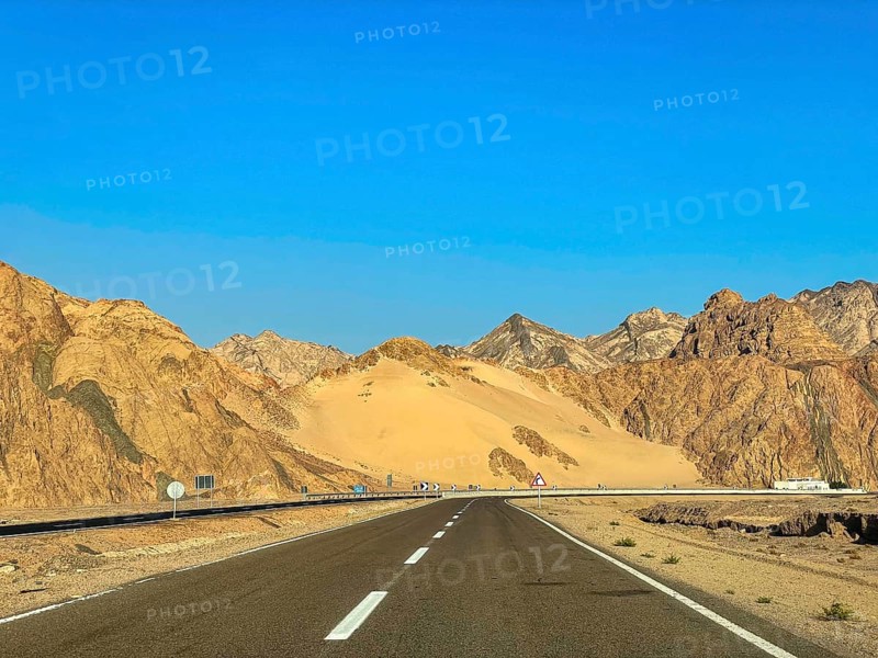Car driving in the sunshine on the Sharm el-Sheikh Dahab road