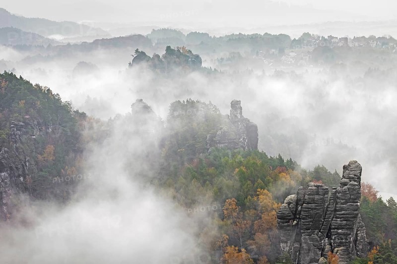 View over the Raaber Kessel in the mist in the Elbe Sandstone Mountains