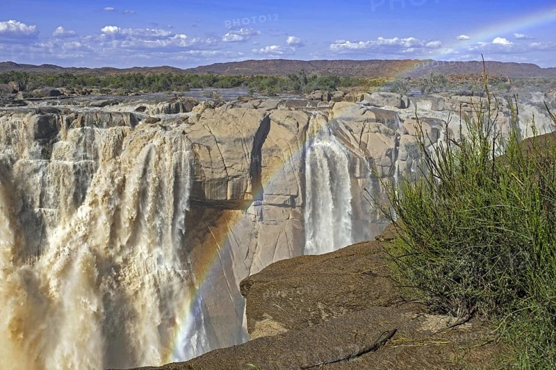 Rainbow over waterfall on the Orange River in the Augrabies Falls National Park in the Northern Cape Province