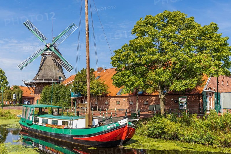 Gallery windmill with canal boat in Ostgrossefehn
