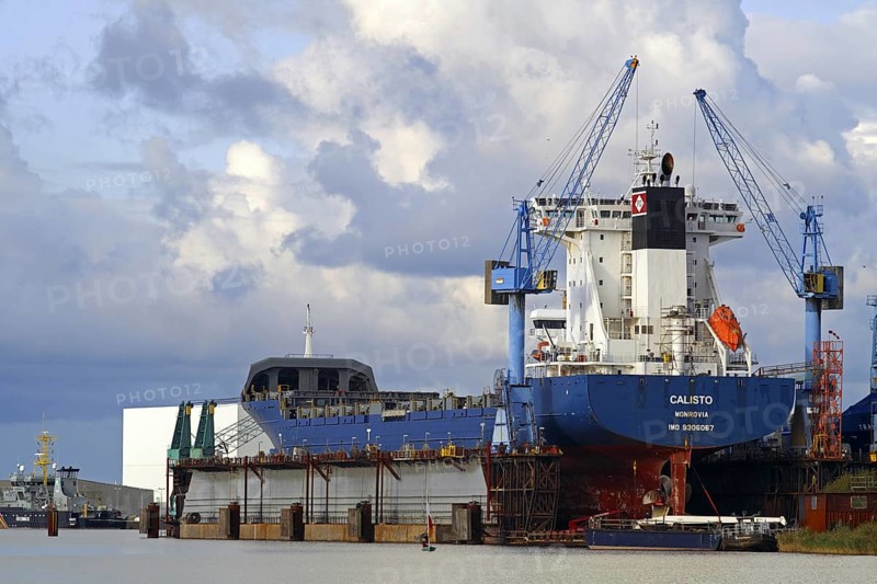 Cargo ship in the floating dock of a shipyard in Luneorthafen