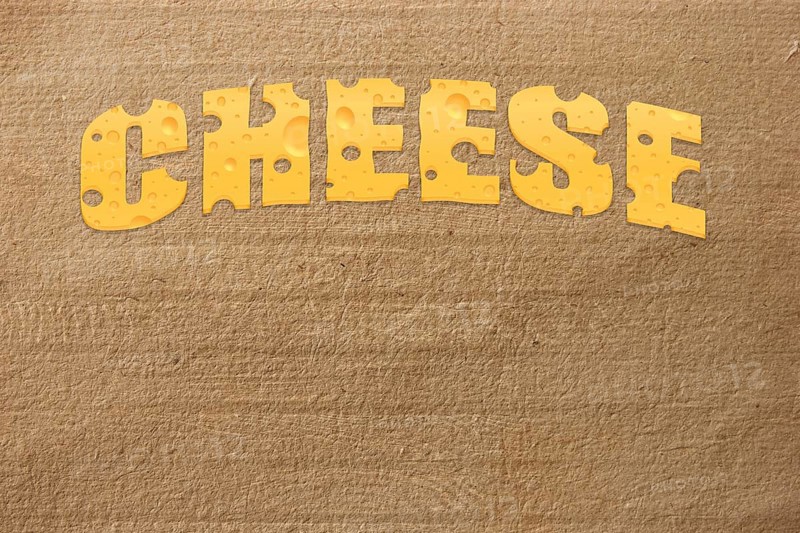 Title cheese on cardboard background
