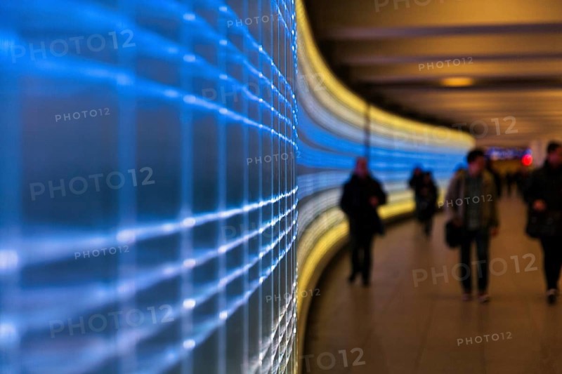 Passers-by in underground passage Passerelle