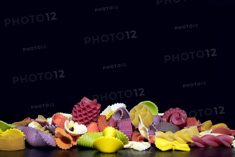 Colourful pasta in different shapes