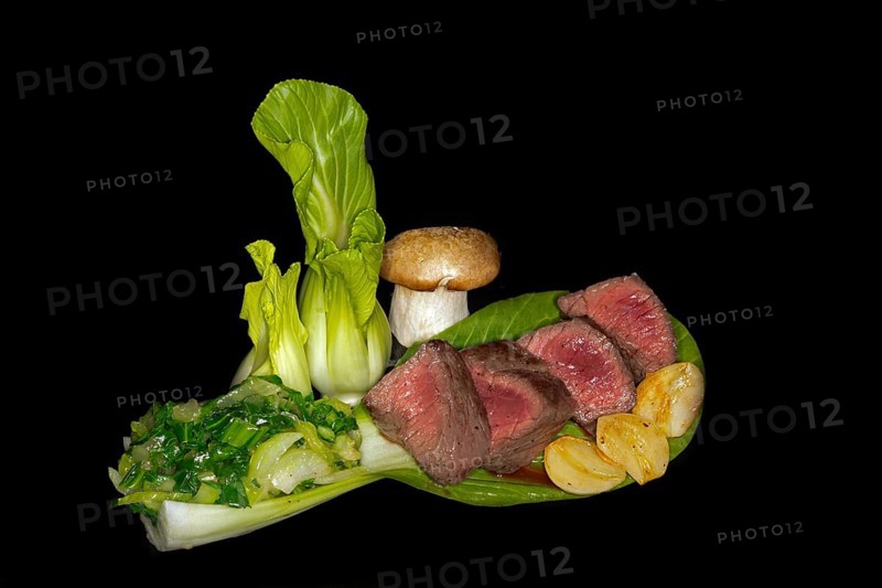 Medium roasted venison fillet with pak choi