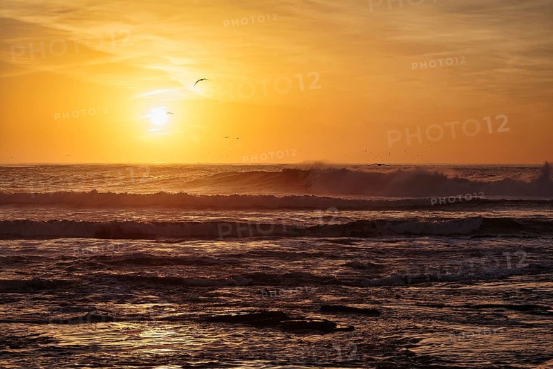 Waves at sunset on the Atlantic Ocean