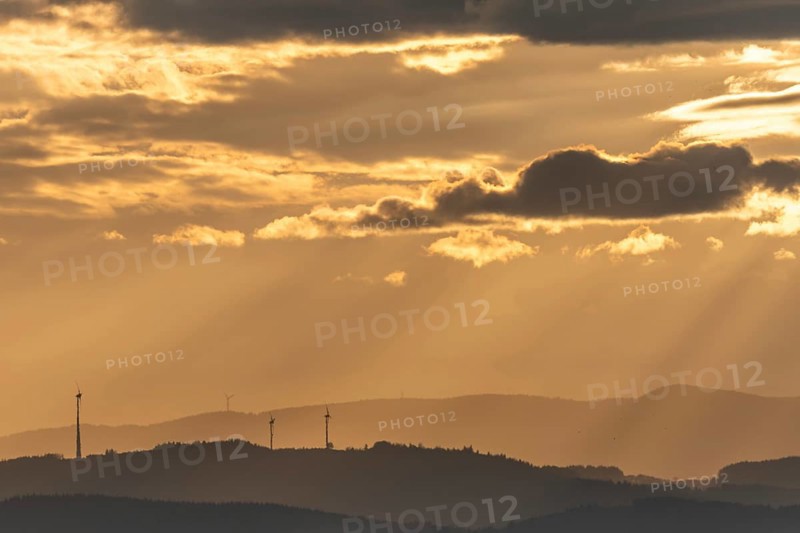 Wind turbines on the mountains of the Black Forest at dawn. Freiburg brisgau