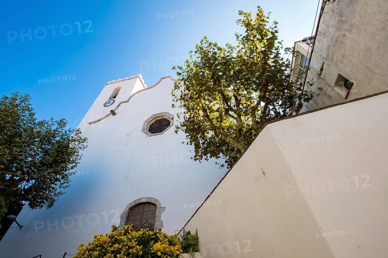 View of the facade of the church of the mother of ten snow in the center of the city of Port de la Selva in Cap de Creus north of the Costa Brava in Catalonia Spain