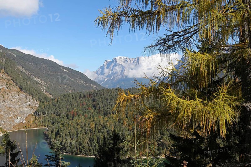 View of the Zugspitze massif with Blindsee lake in autumn