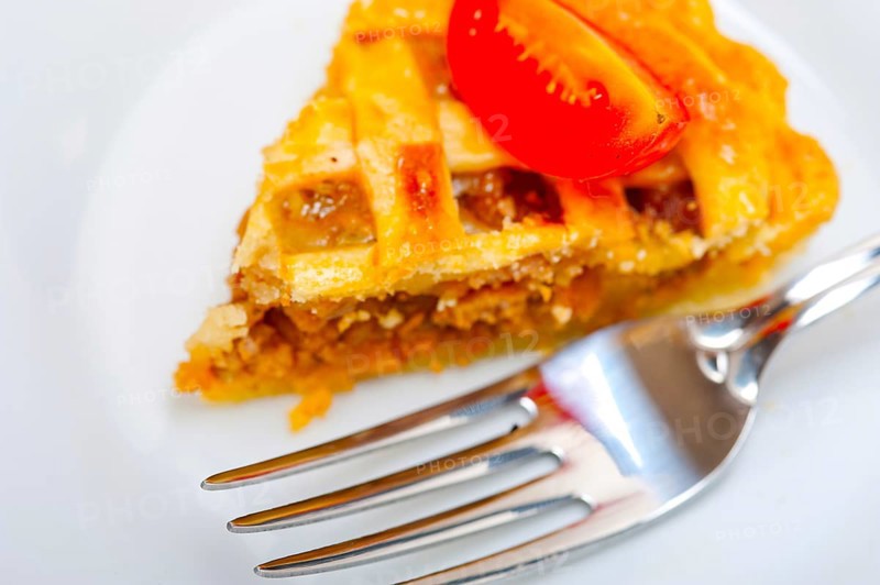 Fresh baked home made beef pie macro closeup