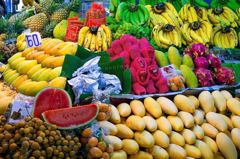 Typical stalls with huge selection of fresh fruits and vegetables at Banzaan fresh market