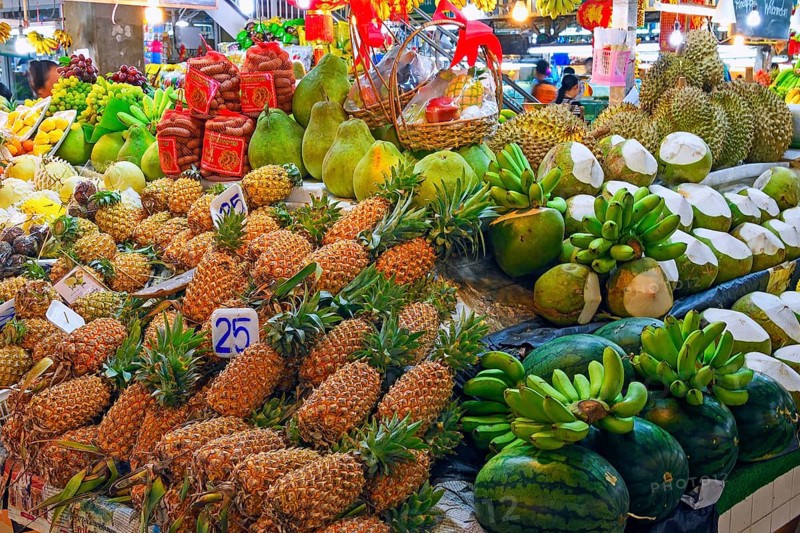 Typical stalls with huge selection of fresh fruits and vegetables at Banzaan fresh market
