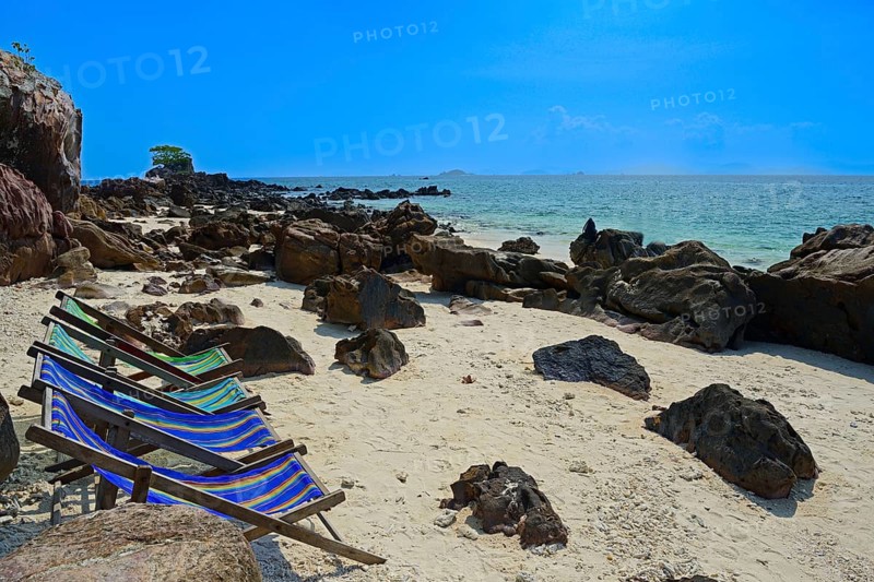 Beach with limestone rocks on Koh Khai Island