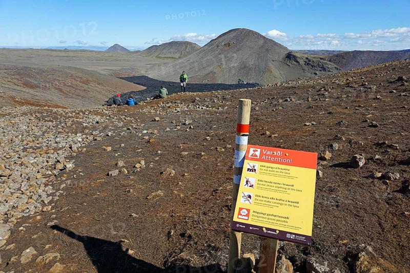Warning sign near lava field