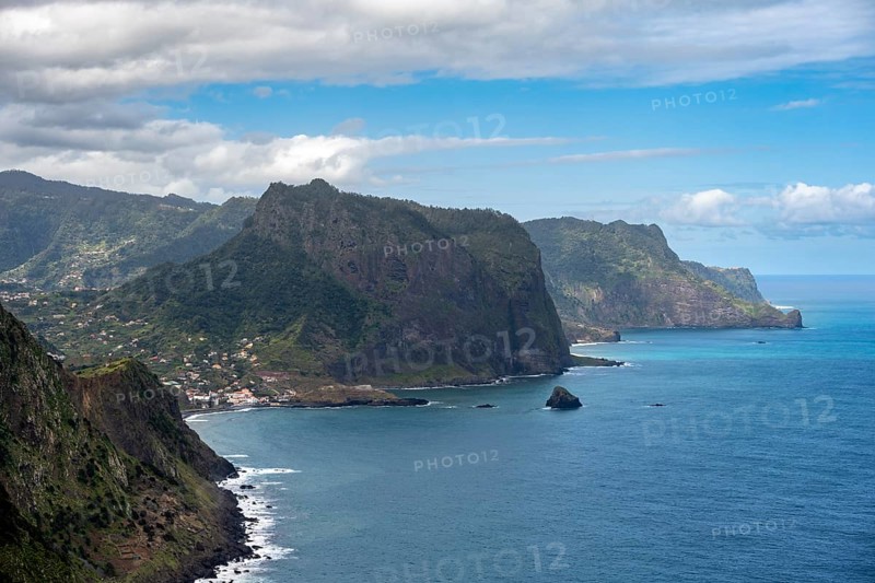View of steep rocky coast and sea