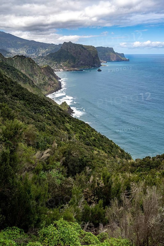 View of steep rocky coast and sea