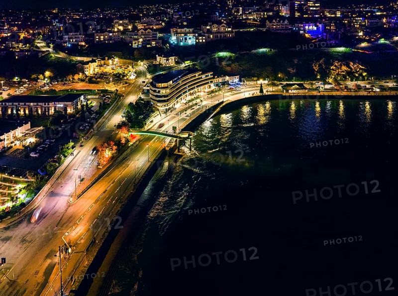Night over Torbay Road and Torre Abbey Sands from a drone
