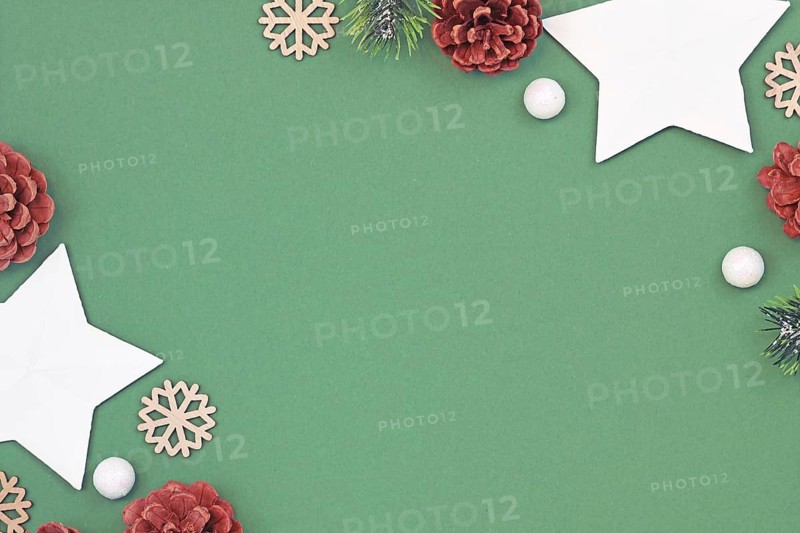 Christmas flat lay background with seasonal white paper stars