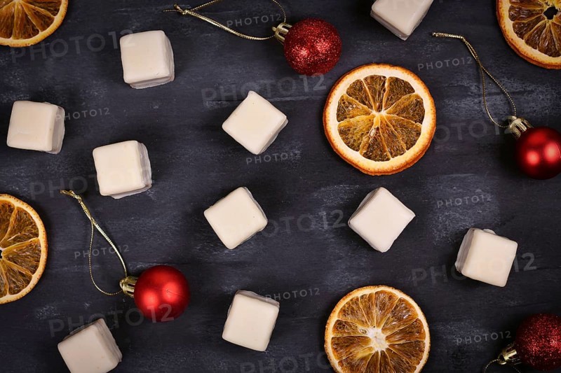 German candy called Dominosteine and orange slices. A Christmas food consisting of gingerbread