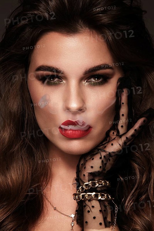 Beautiful sexy brunette girl with bright makeup
