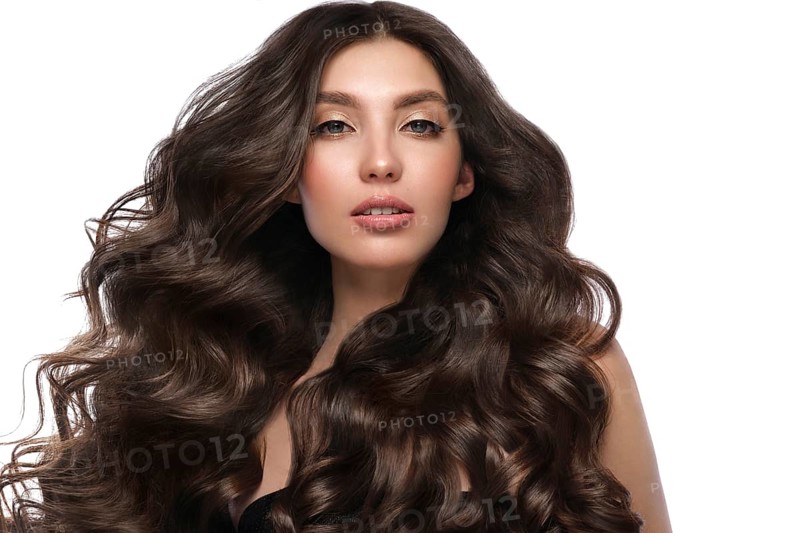 Beautiful brown-haired girl with a perfectly curls hair