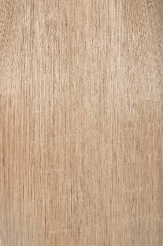 Close-up of shiny smooth blond hair