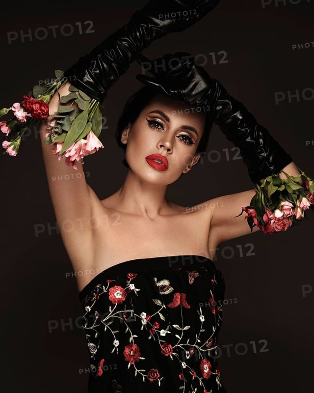 Beautiful brunette woman iwith a classic make-up