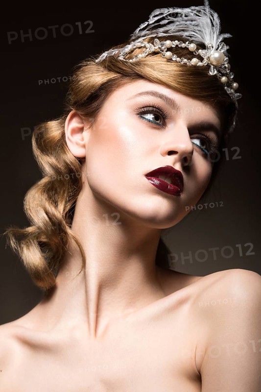 Portrait of elegant retro woman with beautiful hair and dark lips. Beauty face. Picture taken in the studio