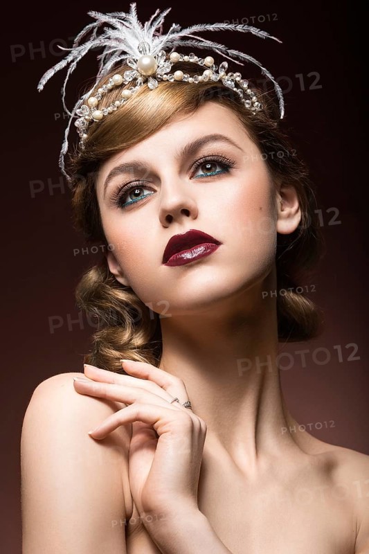 Portrait of elegant retro woman with beautiful hair and dark lips. Beauty face. Picture taken in the studio