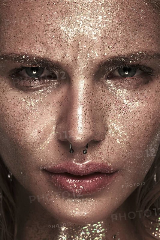 Portrait of a girl with emotion on her face. Photo taken in studio
