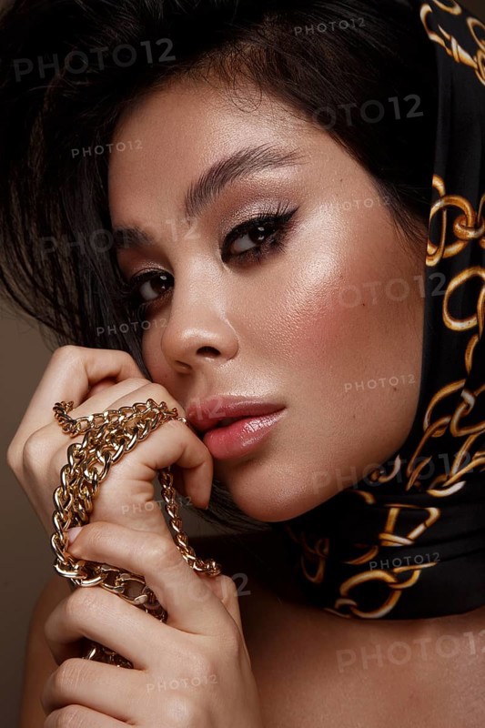 Beautiful Asian brunette model with volume curls