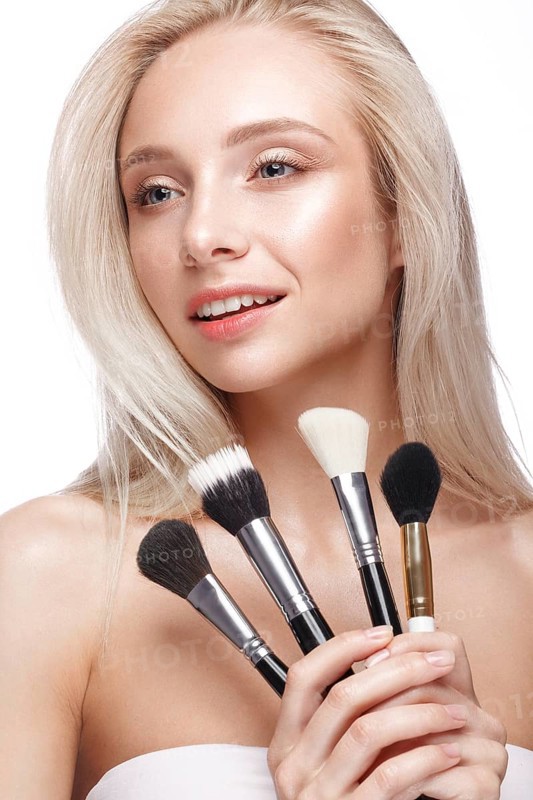 Beautiful young girl with a light natural make-up