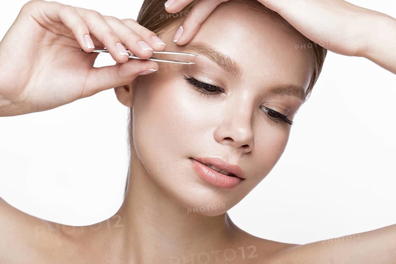 Beautiful young girl with a light natural make-up
