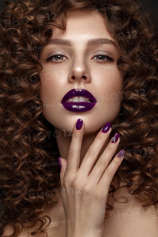 Beautiful girl with evening make-up