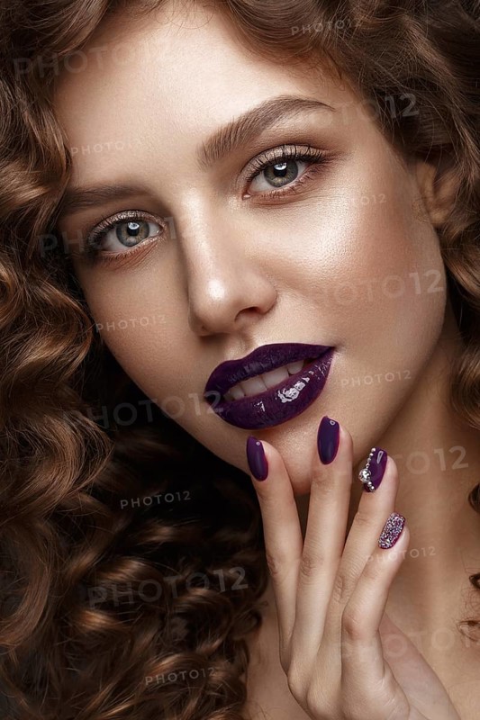 Beautiful girl with evening make-up