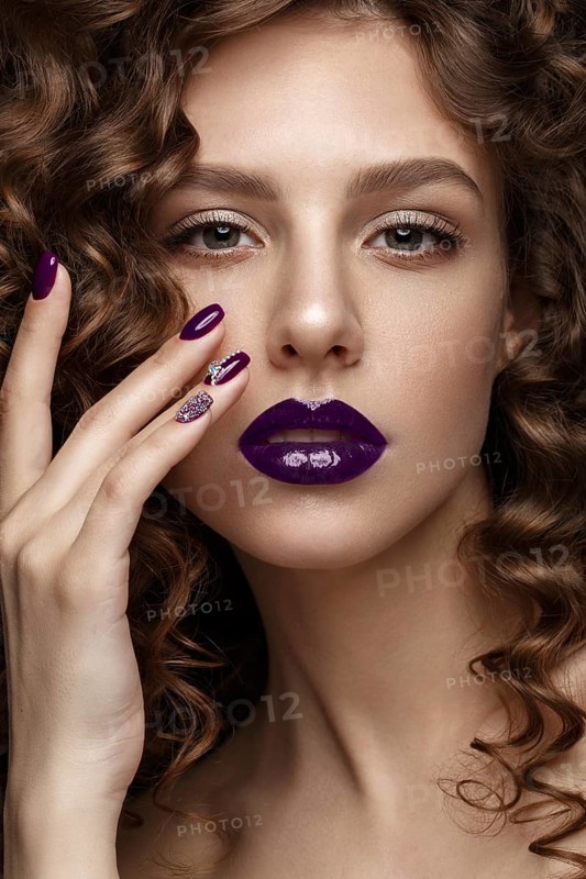 Beautiful girl with evening make-up