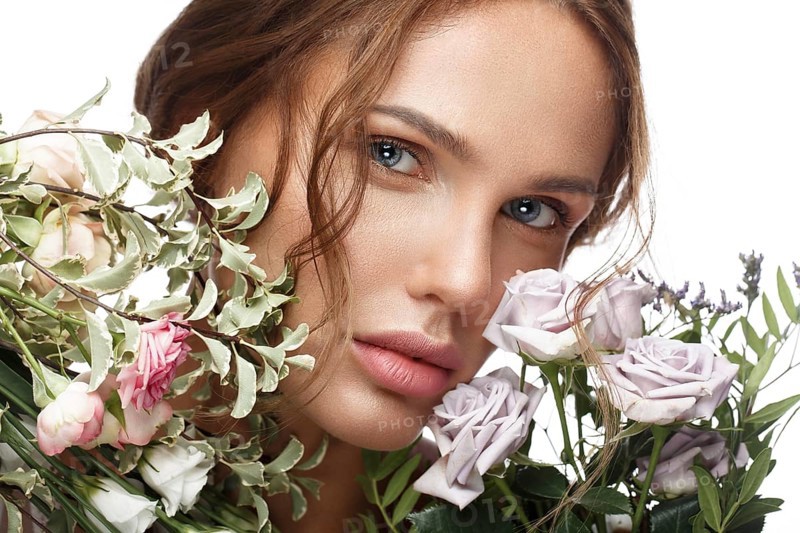 Beautiful woman with classic nude make-up