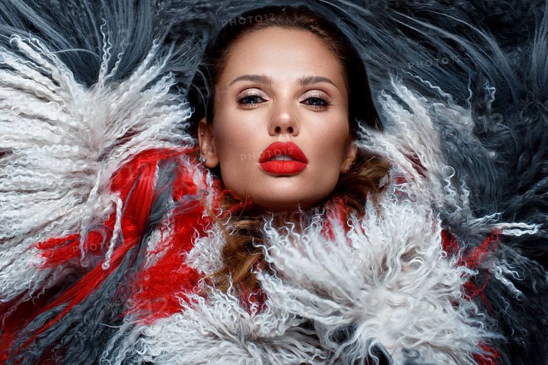 Beautiful woman with classic holiday make-up