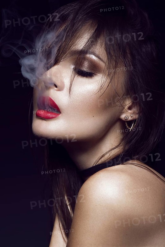 Beautiful sexy brunette girl with bright makeup
