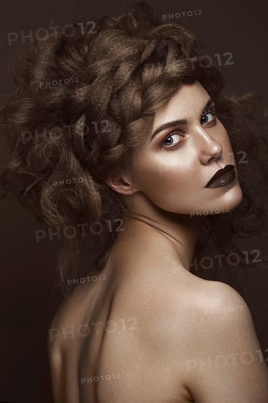 Beautiful girl with creative hairstyle art