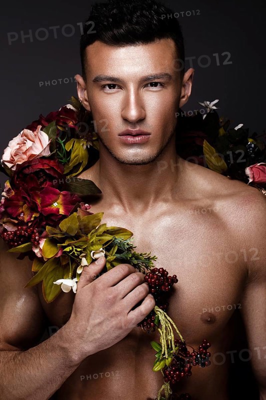A handsome man with a naked torso