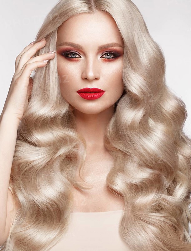 Beautiful blonde in a Hollywood manner with curls