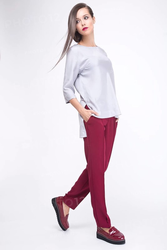 Pretty girl in fashionable stylish clothes