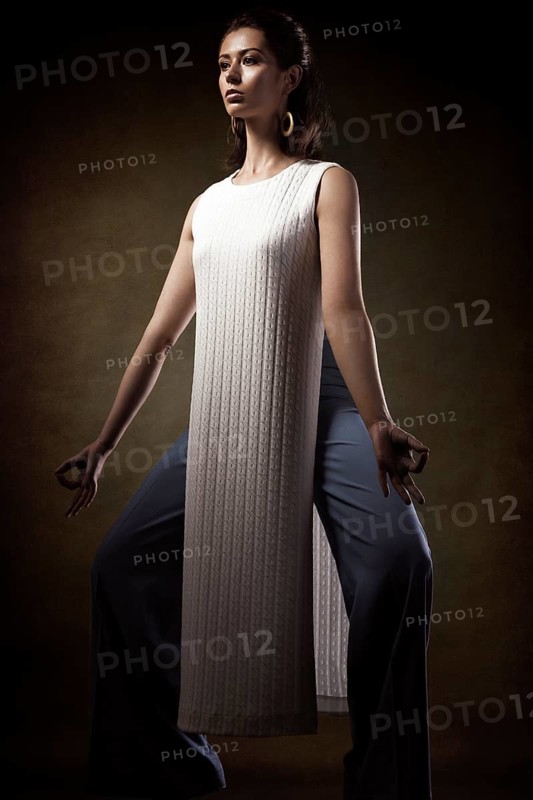 Stylish young athletic girl in fashionable clothes